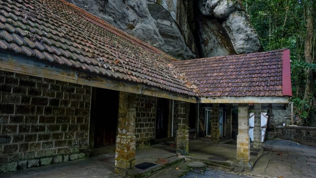 The sacred Elamaldeniya Dewalaya, a traditional Sri Lankan shrine dedicated to local deities, nestled within the ancient forest of the southern foothills